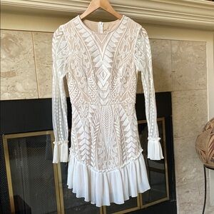 White Sheath Dress with Ruffled Hem and Poet Sleeves